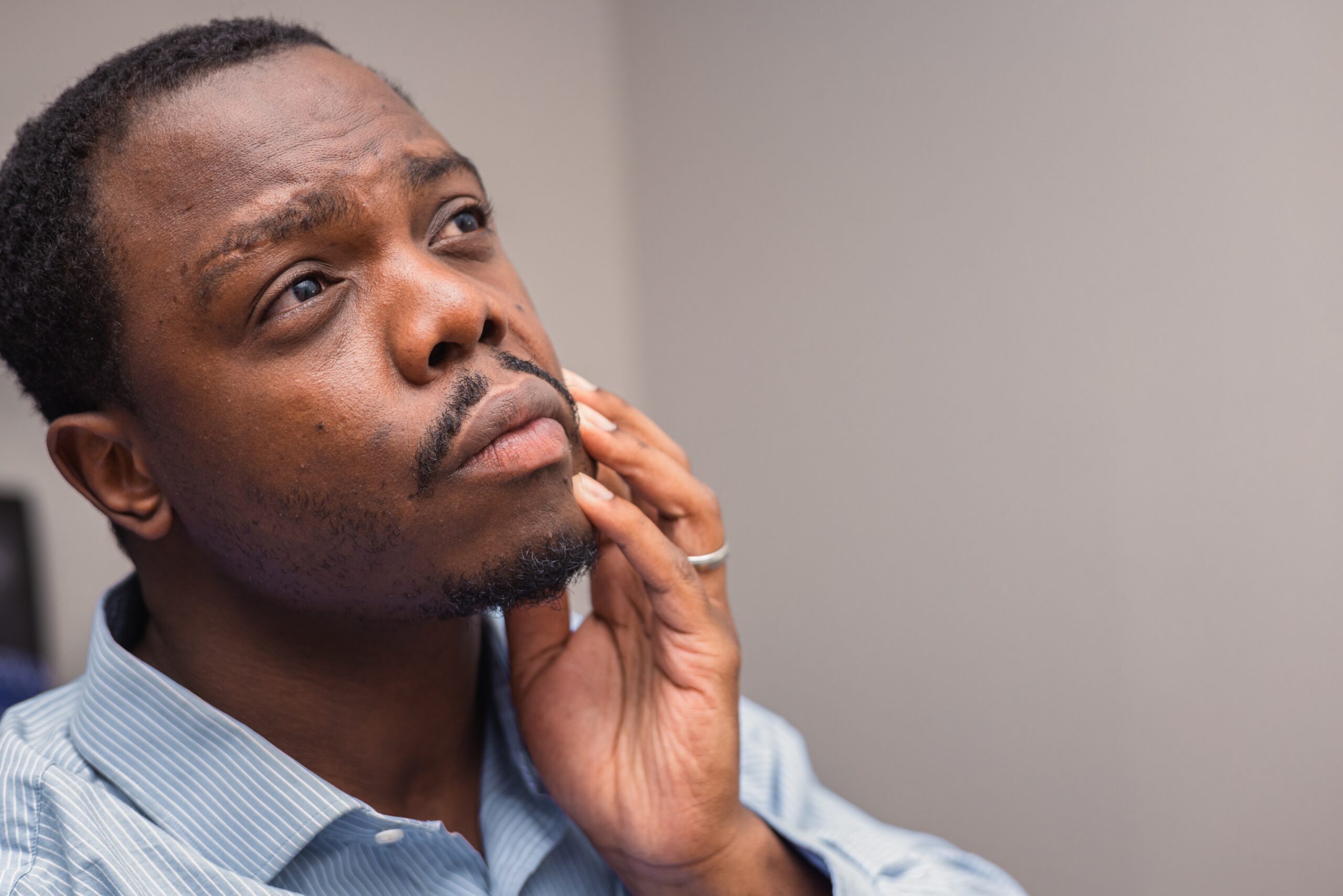 a depressed and anxious black man wondering how long does klonopin stay in your system