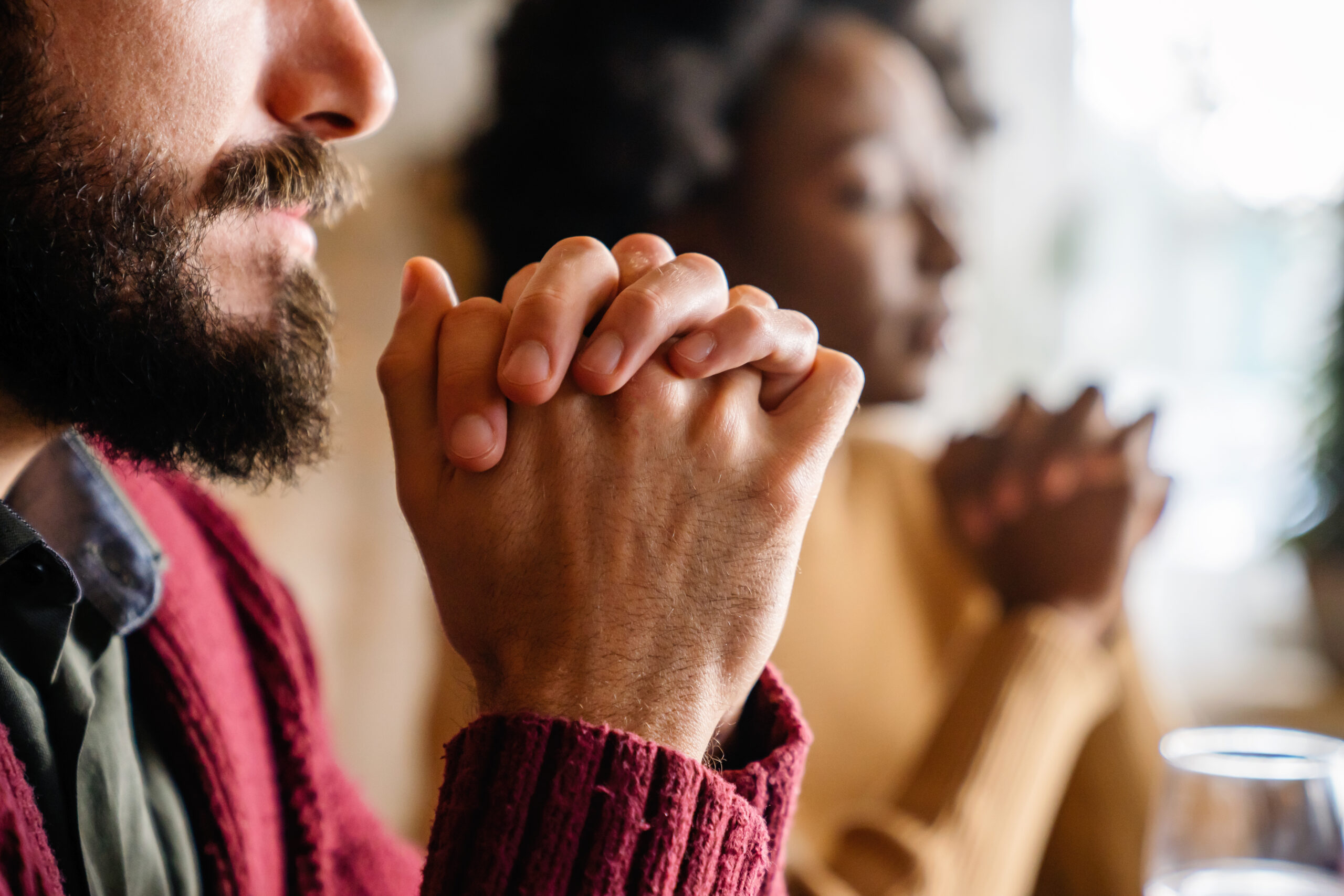 people praying as part of religion and addiction