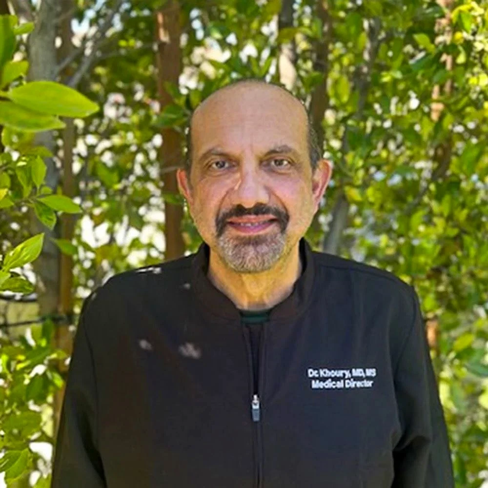 Portrait of Adnan E. Khoury, MD, attending physician at Believe Detox Center