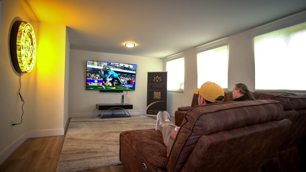 Lounge with entertainment at Believe Detox Center Northridge