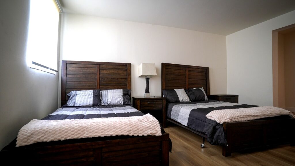 Twin-bed shared room at Believe Detox Center Northridge